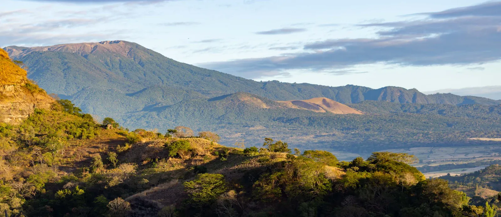 The ridgeline of Santa Ana volcano with cloud below the summit